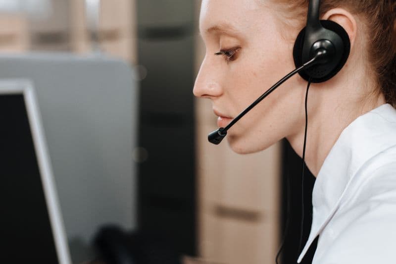 Support agent wearing a headset